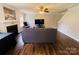 Comfortable living room features a fireplace, hardwood floors and a ceiling fan at 4698 Hannah Dr, Rock Hill, SC 29732