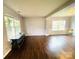 Open living room featuring hardwood floors and lots of natural light at 4698 Hannah Dr, Rock Hill, SC 29732