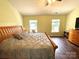 Bright bedroom with natural light, wood floors, and comfortable sleeping arrangements at 4698 Hannah Dr, Rock Hill, SC 29732