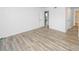 Bedroom features hardwood floors, neutral paint, and natural light at 5833 Harris Grove Ln, Charlotte, NC 28212