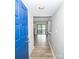 Inviting entryway with wood-look flooring, an open floor plan, and sliding doors with a water view at 5833 Harris Grove Ln, Charlotte, NC 28212
