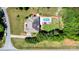 Gorgeous aerial shot of a home showcasing a lovely pool and lush green surroundings at 6603 Havencrest Dr, Denver, NC 28037