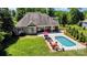 Beautiful home featuring a well-maintained yard, pool, and outdoor patio area at 6603 Havencrest Dr, Denver, NC 28037