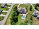 Aerial view of the home highlighting the pool, patio, and manicured lawn at 6603 Havencrest Dr, Denver, NC 28037