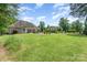 Expansive backyard offering a large green space, perfect for recreation and relaxation near the pool at 6603 Havencrest Dr, Denver, NC 28037