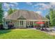 Expansive backyard featuring a well-manicured lawn, patio, and outdoor dining area at 6603 Havencrest Dr, Denver, NC 28037