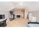 Bedroom with sloped ceilings featuring a bed, a desk, and a garment rack with hanging clothes at 6603 Havencrest Dr, Denver, NC 28037