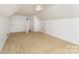 Spacious bonus room is carpeted with neutral paint and a ceiling fan at 6603 Havencrest Dr, Denver, NC 28037