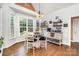 Charming breakfast nook with a table, large windows, and decorative coffee bar at 6603 Havencrest Dr, Denver, NC 28037