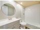 A renovated bathroom features white subway tile and a sleek vanity at 7129 Stonington Ln, Charlotte, NC 28227