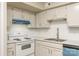 An up close, updated kitchen offers white shaker cabinets at 7129 Stonington Ln, Charlotte, NC 28227