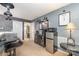 Basement area featuring a convenient kitchenette with stainless steel appliances and a nearby full bathroom at 7318 Agnew Dr, Charlotte, NC 28278