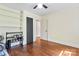 Bright bedroom with hardwood floors, shelving, and ample storage throughout at 851 Gist Rd, Rock Hill, SC 29732