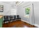 Cozy dining area with hardwood floors, windows, and a stylish light fixture at 851 Gist Rd, Rock Hill, SC 29732