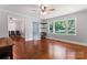 Light-filled living room showcasing beautiful hardwood floors, large windows, and neutral walls at 851 Gist Rd, Rock Hill, SC 29732
