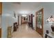 Inviting hallway with light-toned flooring leads to bedroom, offers a welcoming entry at 857 Hills Rd, Belmont, NC 28012
