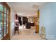 Inviting interior view of a living room featuring wood floors and easy access to the kitchen at 857 Hills Rd, Belmont, NC 28012