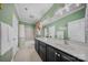 Bathroom with double sinks, a large mirror, and a shower/tub combination at 9075 Blue Ridge Dr, Indian Land, SC 29707