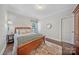 Bedroom featuring wood floors and a neutral color palette at 9075 Blue Ridge Dr, Indian Land, SC 29707