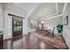 Elegant dining room with hardwood floors, tray ceiling, and ample natural light at 9075 Blue Ridge Dr, Indian Land, SC 29707