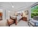 Comfortable main bedroom boasts trey ceilings, plush carpeting, and plenty of natural light at 9075 Blue Ridge Dr, Indian Land, SC 29707