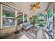 Covered patio with outdoor seating and a ceiling fan at 9075 Blue Ridge Dr, Indian Land, SC 29707