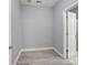 Unfinished basement with durable vinyl flooring and access to an additional bathroom at 908 Sundance Dr, Gastonia, NC 28054