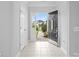 Inviting entryway with neutral walls and flooring, features a stylish black front door and ample natural light at 908 Sundance Dr, Gastonia, NC 28054