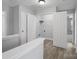 Upstairs hallway with storage closets and an open view of bedrooms at 908 Sundance Dr, Gastonia, NC 28054