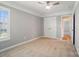 Spacious bedroom with neutral walls and a walk-in closet at 9711 Castle Terrace Ct, Charlotte, NC 28215
