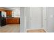Inviting entryway featuring hardwood floors and a view of the kitchen at 9711 Castle Terrace Ct, Charlotte, NC 28215
