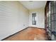 Screened in porch featuring a light colored wall and access to the outdoors at 9711 Castle Terrace Ct, Charlotte, NC 28215