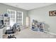 Bedroom featuring 2 windows and filled with light at 1031 Butterburr Dr, Matthews, NC 28104