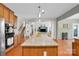 Modern kitchen featuring a center island with hardwood floors at 1031 Butterburr Dr, Matthews, NC 28104