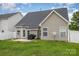 Exterior view of backyard featuring grill, patio and well maintained lawn at 108 Copes Ct, Rock Hill, SC 29732
