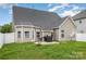 Home's backyard with grill, well maintained lawn, and patio at 108 Copes Ct, Rock Hill, SC 29732