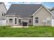 Home's backyard with a grill, patio, and ample space to relax at 108 Copes Ct, Rock Hill, SC 29732