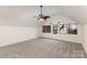 Large bedroom featuring plush carpet, a ceiling fan, and bright natural light at 108 Copes Ct, Rock Hill, SC 29732