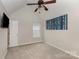 Carpeted bedroom with ceiling fan and bright window, offering a comfortable and inviting space at 108 Copes Ct, Rock Hill, SC 29732