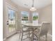 Cozy breakfast nook with ample natural light and a door leading to the outdoors at 108 Copes Ct, Rock Hill, SC 29732