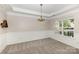 Dining room features a hanging light fixture, wainscoting, and bright picture window at 108 Copes Ct, Rock Hill, SC 29732
