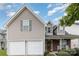 Charming home featuring a two-car garage, manicured lawn, and inviting front porch at 108 Copes Ct, Rock Hill, SC 29732