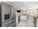 Kitchen with stainless steel refrigerator and views into the breakfast nook at 108 Copes Ct, Rock Hill, SC 29732
