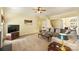 Spacious living room with plush furniture and a view of the stairway at 1117 Yarrow St, Matthews, NC 28104