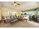 Open-concept living room seamlessly connecting to the kitchen and dining area at 1117 Yarrow St, Matthews, NC 28104