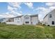 Spacious backyard with a well-maintained lawn, privacy fence, and lush green grass at 1121 Freeman View Dr, Albemarle, NC 28001