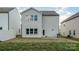 Home backyard with green grass and a patio at 1121 Freeman View Dr, Albemarle, NC 28001