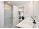 This bathroom offers a double vanity, walk-in shower, and entrance to another room at 1121 Freeman View Dr, Albemarle, NC 28001