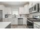 Beautiful kitchen with stainless steel appliances, white cabinets, and a bright, clean aesthetic at 1121 Freeman View Dr, Albemarle, NC 28001