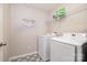 Functional laundry room with modern washer and dryer units at 1121 Freeman View Dr, Albemarle, NC 28001